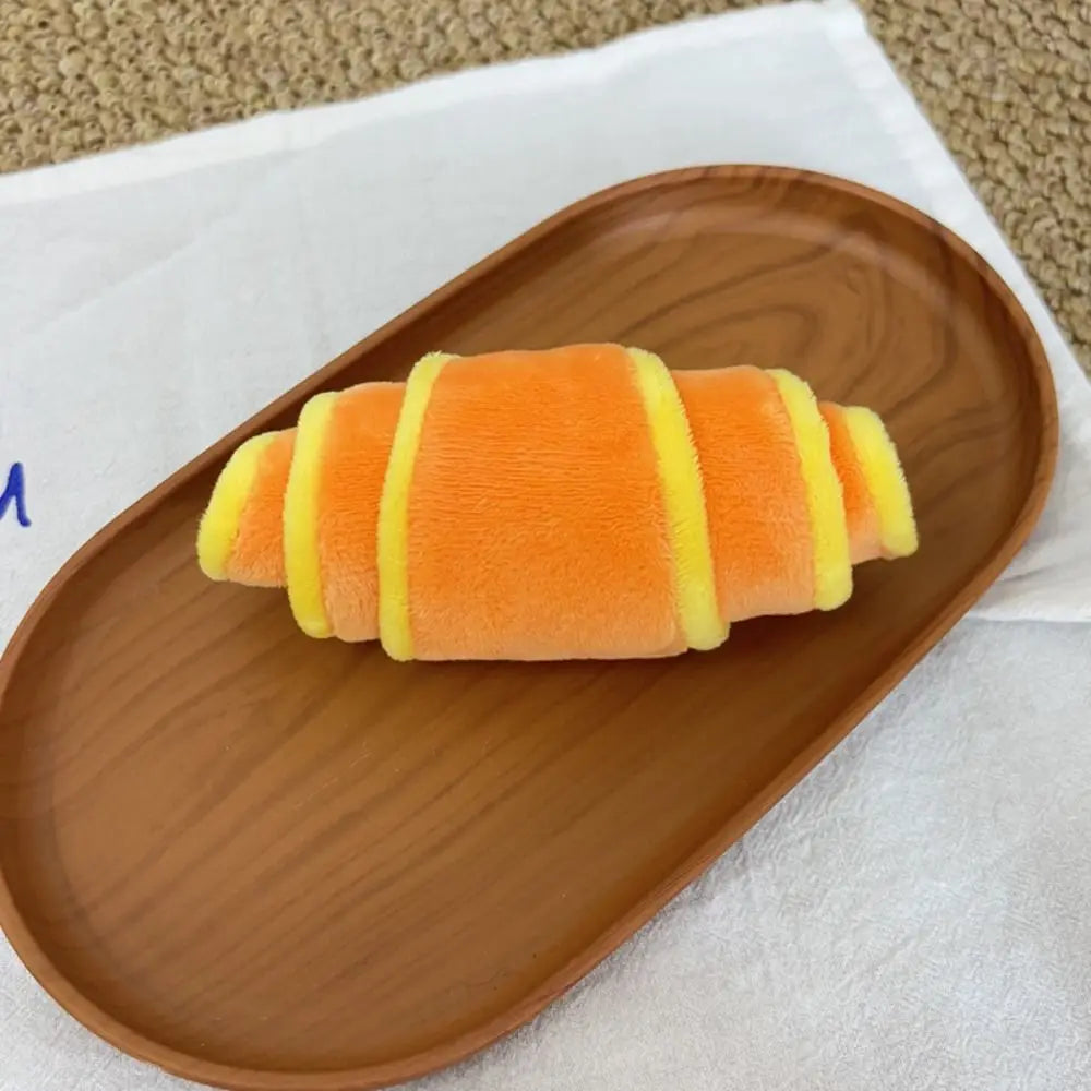 Jouet croissant moelleux à mâcher pour chien